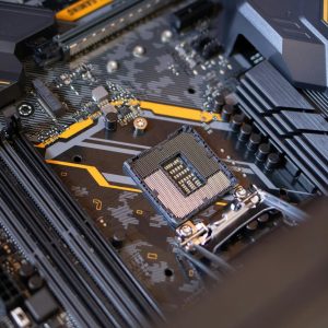 Detailed view of a computer motherboard highlighting electronic components and technology connections.